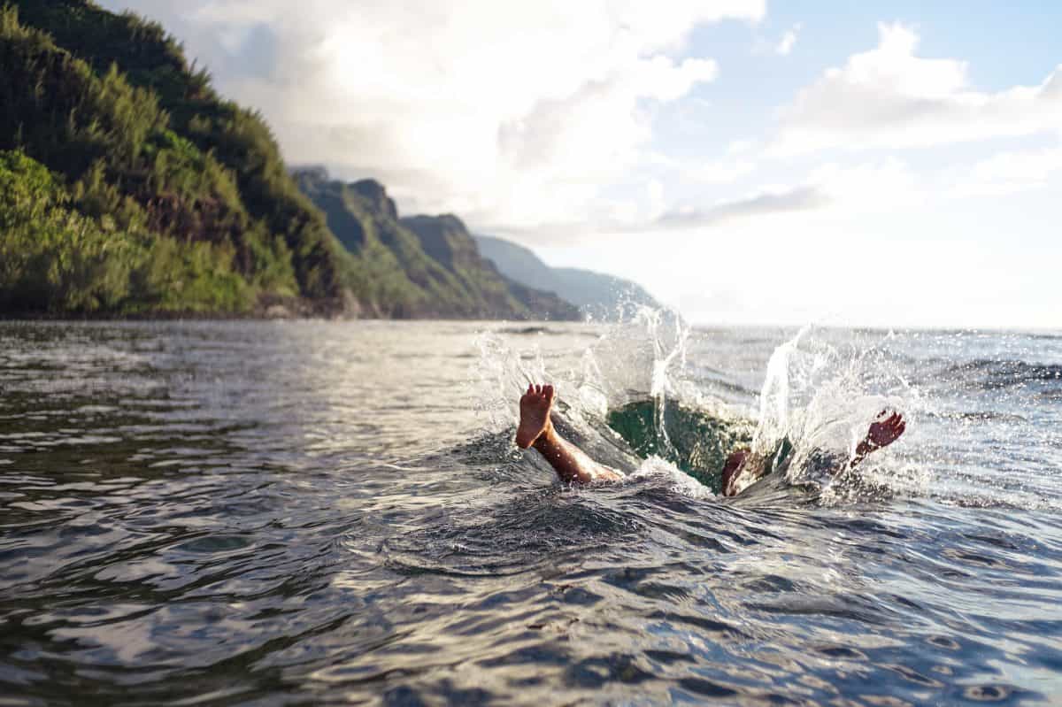 Kayak Sinking and man falling into water