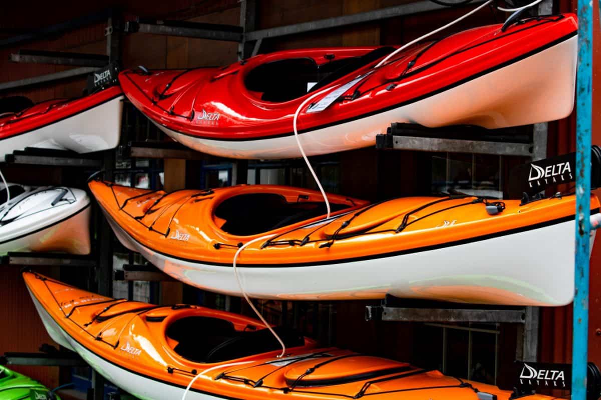 3 Kayaks on a rack - shine from kayak wax