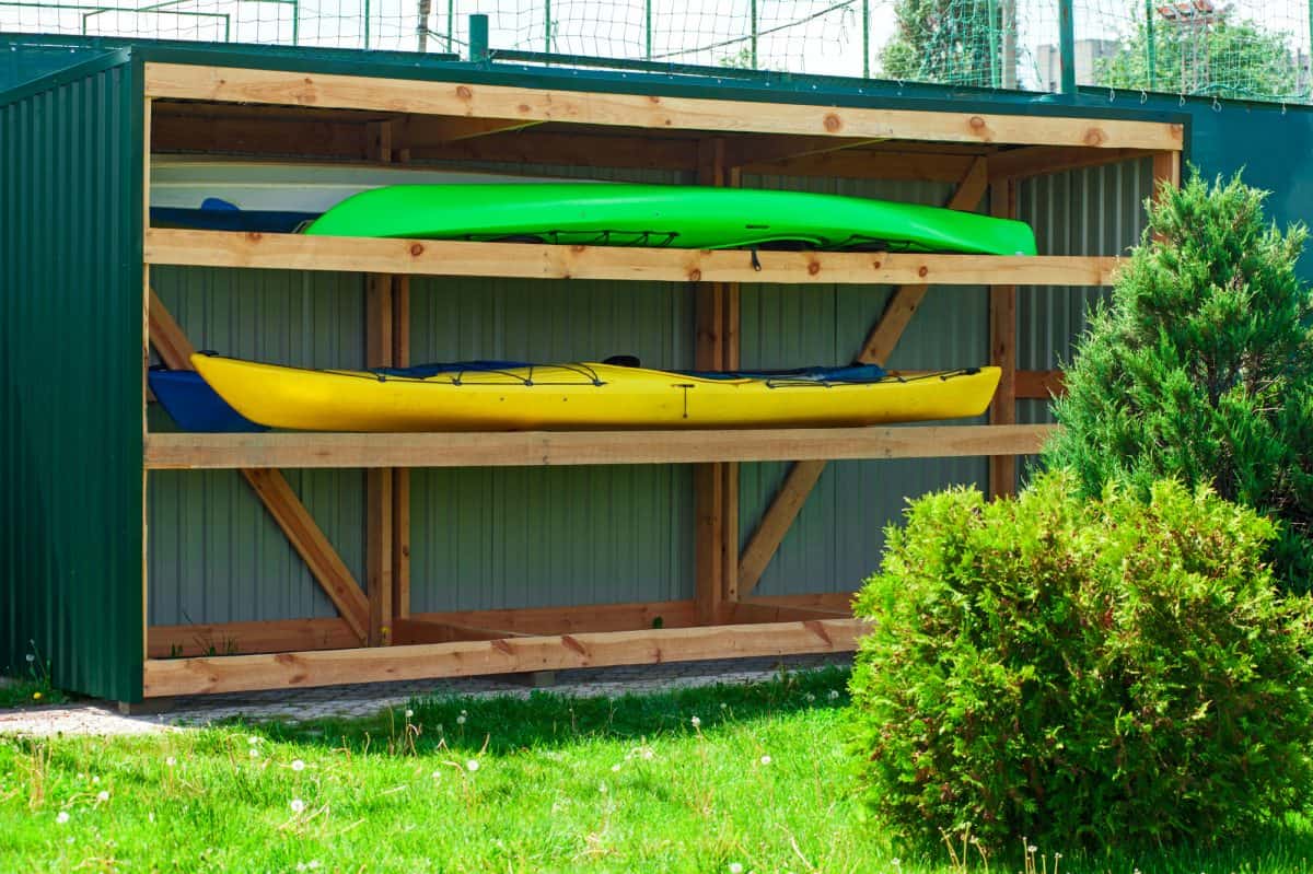 Kayak storage - kayak on outdoor DIY storage rack