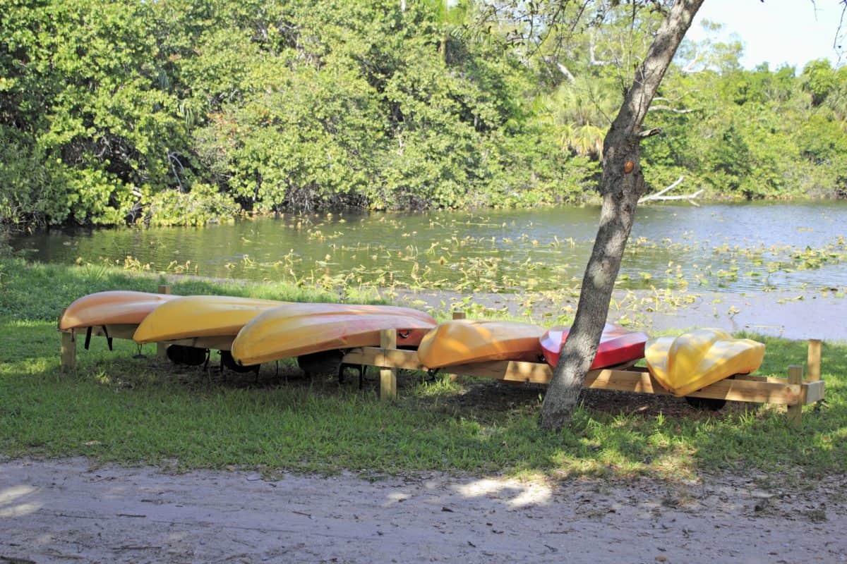 Kayak dying in the sun next to the lake