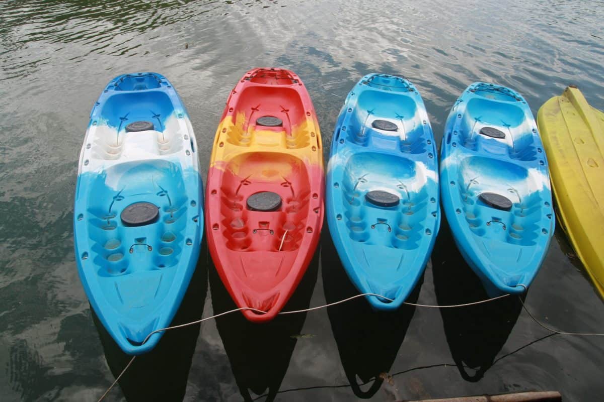 4 sit-on-top kayaks with scupper plugs