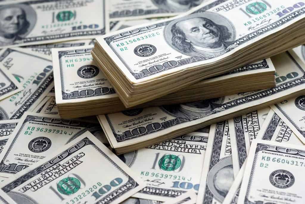 Kayak prices - Dollar bank note money background